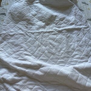 Crib mattress protector and fitted sheets